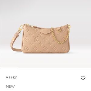Louis Vuitton Tan Clutch with Monogram Embossed Leather
